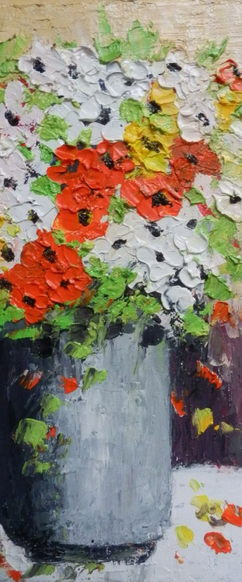 Colorful flowers in a pot by Maria Karalyos
