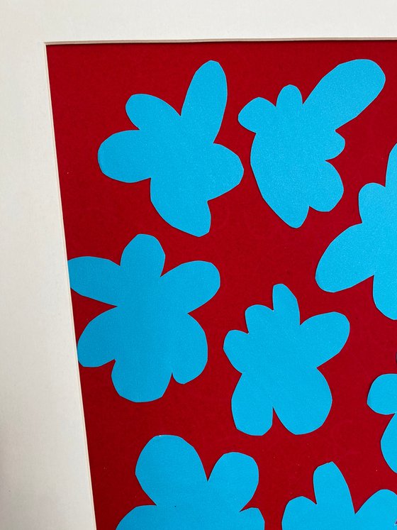 Blue Flower on Red Background