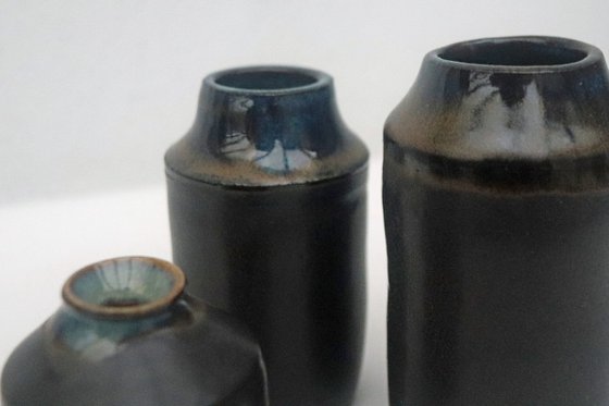 Three Little Black Vessels.