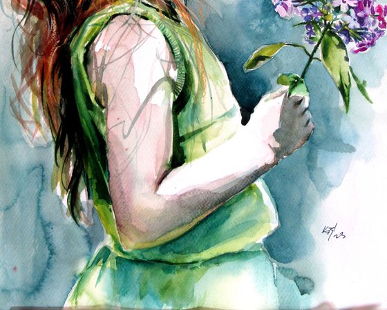 Little girl with purple flower