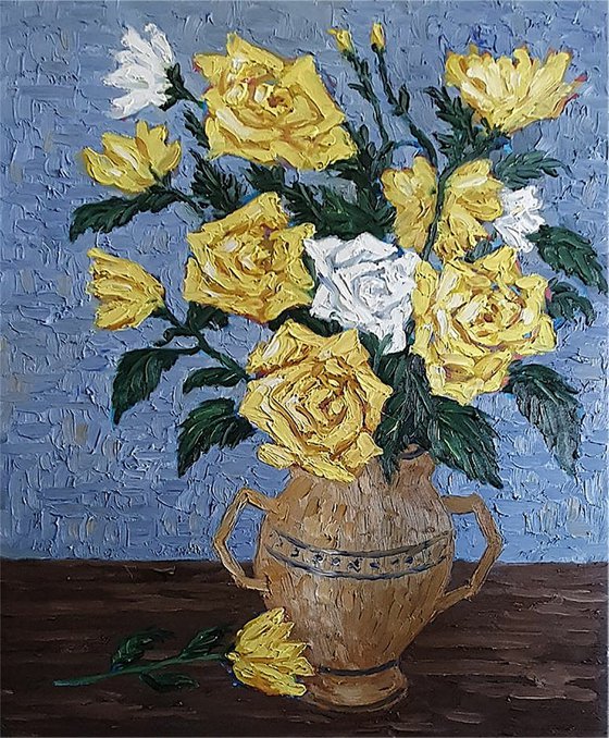 vase of yellow roses