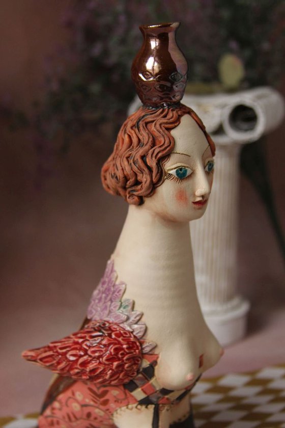 Bird Women with a jug. Ceramic sculpture