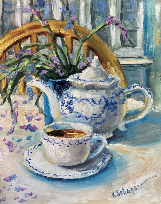 Teacup and teapot on the table .Still life.