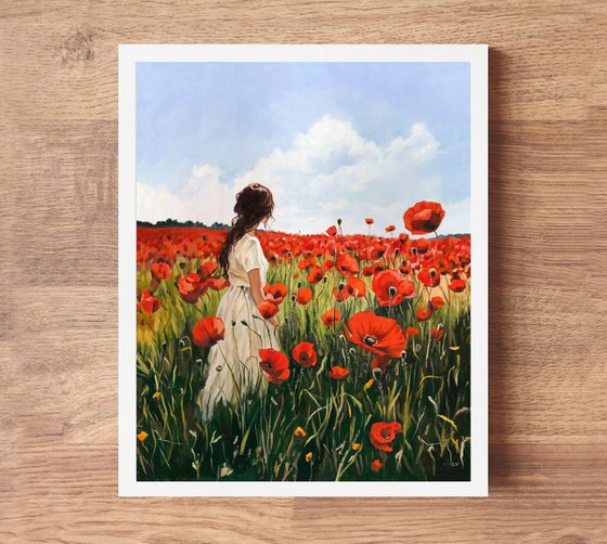 Woman in a red poppy field