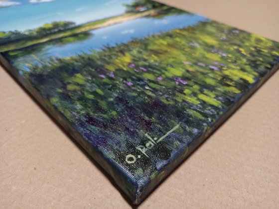 A farmstead by the river