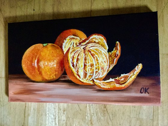 Still life with peeled Oranges. Oil painting.