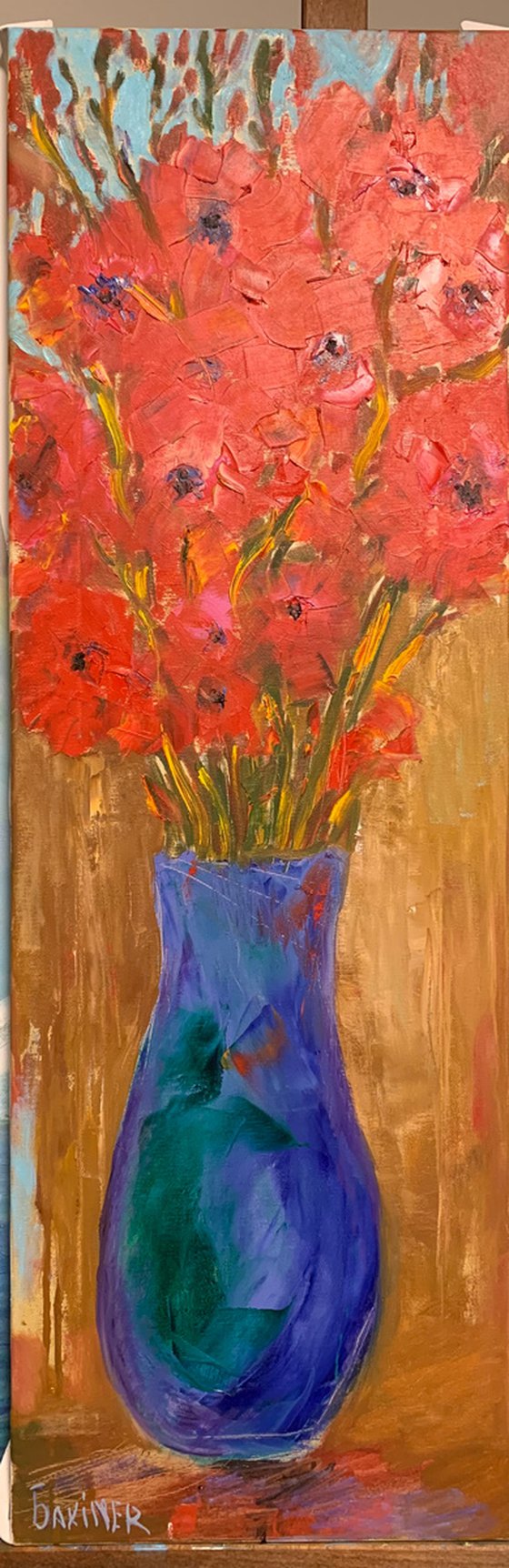 gladioli in a blue vase