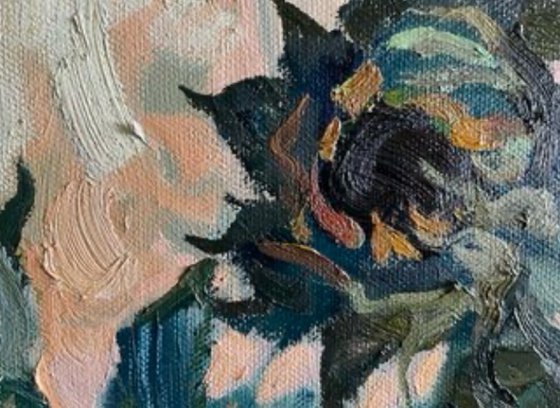 Sunflowers in a blue vase