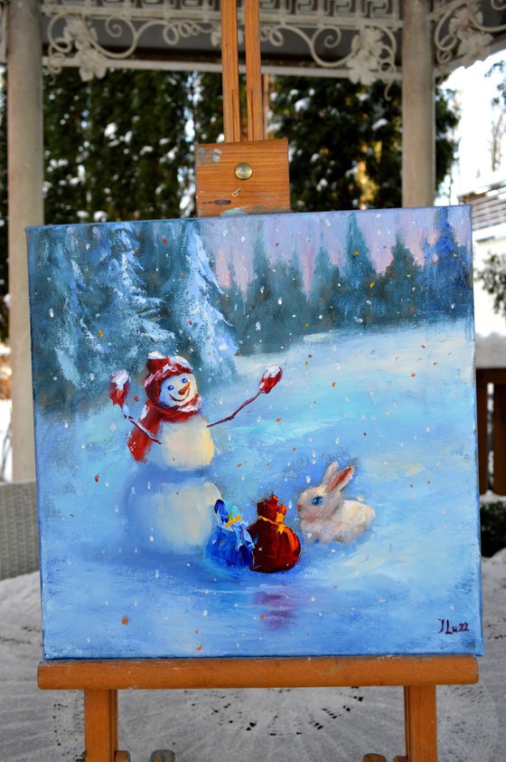 The snowman and the rabbit are handing out gifts to everyone