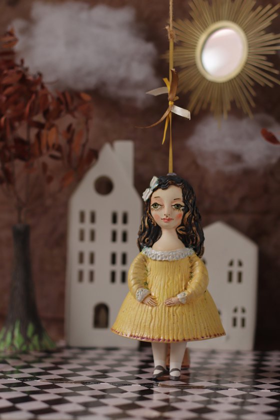 Little Girl in Yella. Hanging sculpture, bell doll by Elya Yalonetski