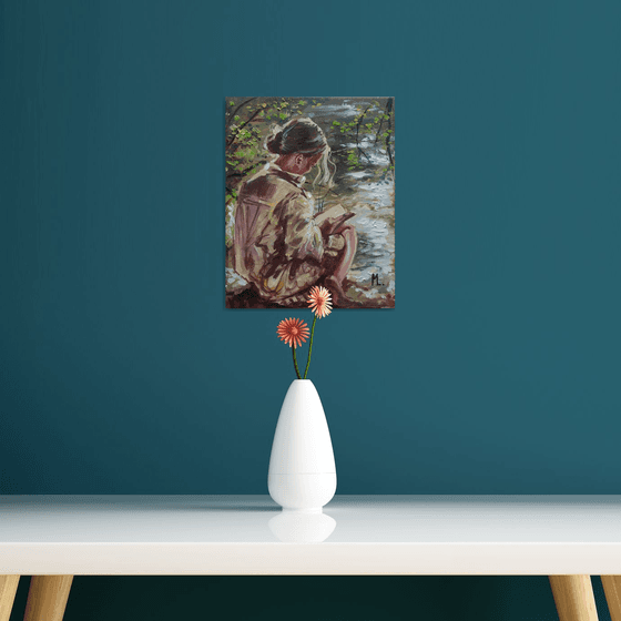 " WAITING FOR SPRING WITH BOOK ON LAKE "