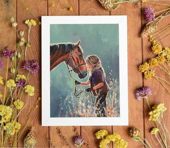 Girl kissing a brown horse