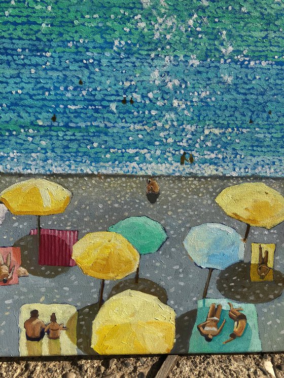Beach day and yellow umbrellas