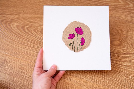 Magenta poppies drawing on the author's craft paper