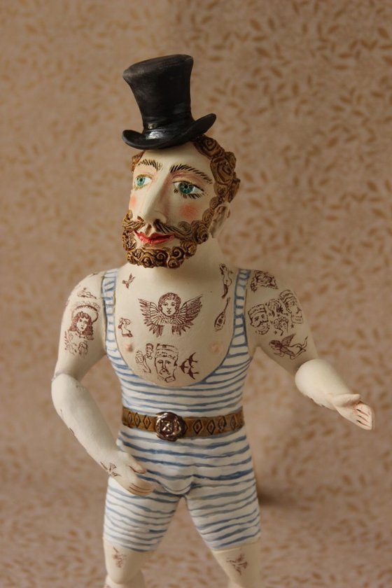 Circus athlete with hipster beard. Wall sculpture by Elya Yalonetski.