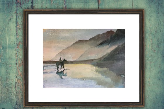 Horse Riding On The Beach At Dawn