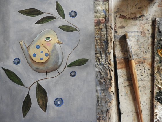 The bird between the leaves