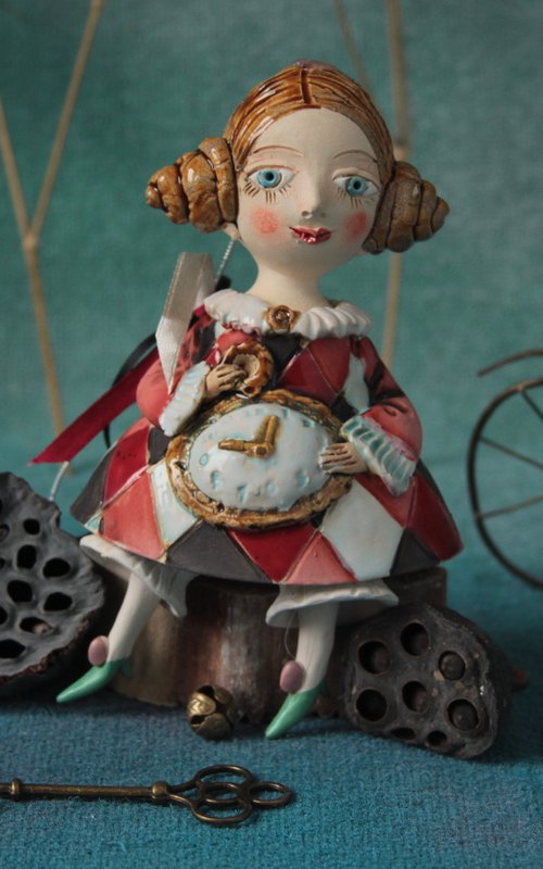 Little Girl in a harlequin dress. Hanging sculpture, bell doll by Elya Yalonetski by Elya Yalonetski