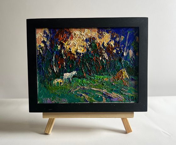 Yellow sunset behind tree