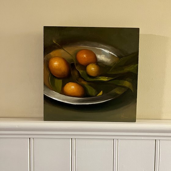 Citrus on a pewter plate