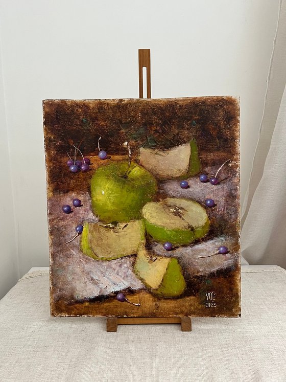 Green apples on dark