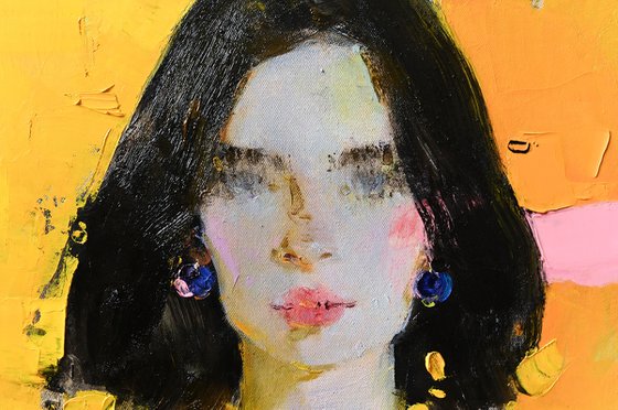 Woman portrait on yellow