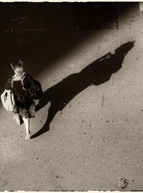 a girl and her shadow by Daniel Fontaine