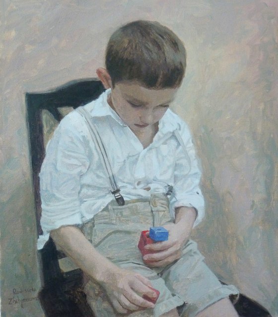 Boy with red and blue cubes