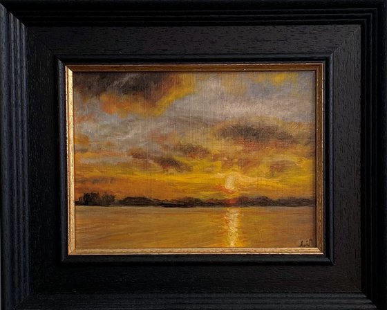 Sunset Over The Sea framed ready to hang.