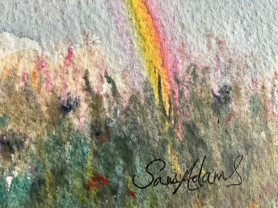 Rainbow over the hedgerow