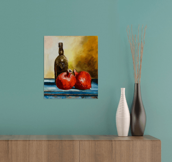 Pomegranates and oil bottle, rustic  style still life. Palette knife painting on linen canvas