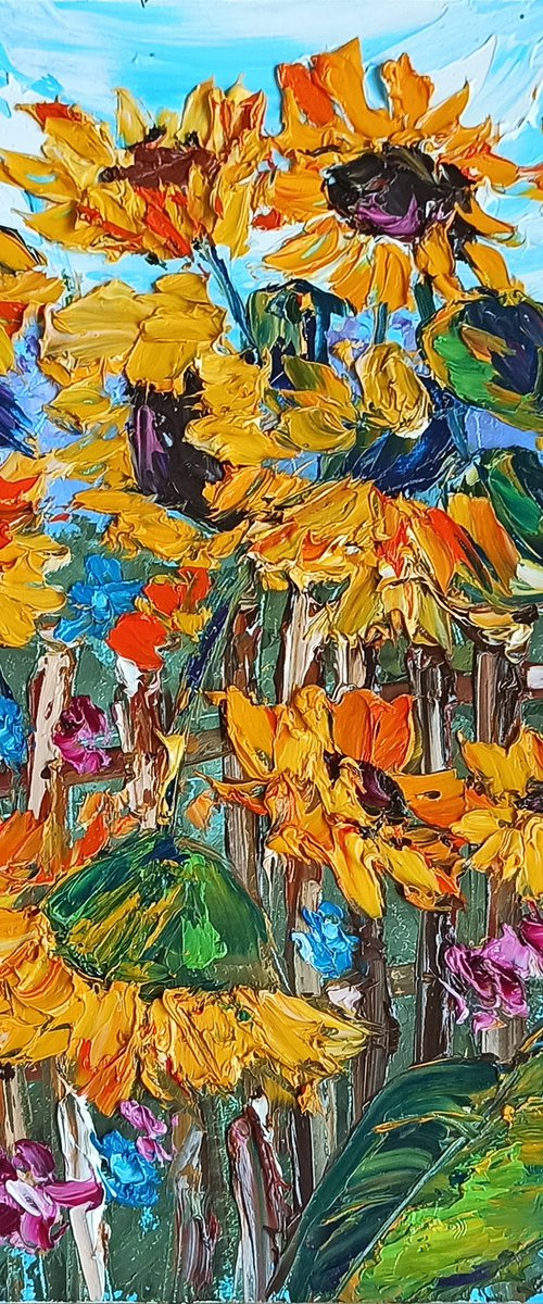 Sunflowers over the fence by Oksana Fedorova