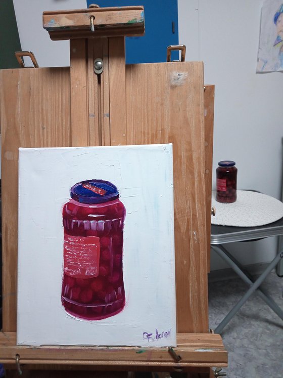 Still life with cherries in a glass jar