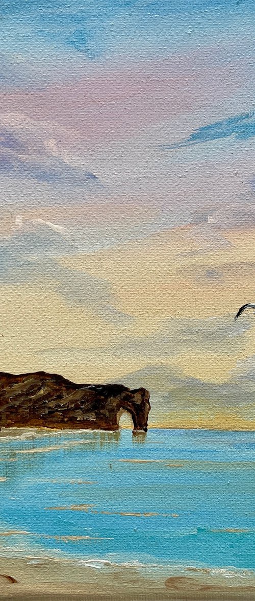 Peaceful Sunrise over Durdledoor by Marja Brown
