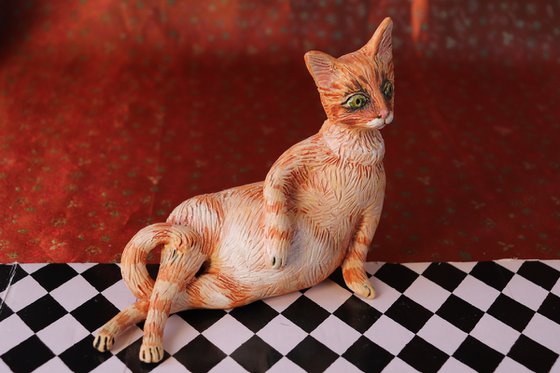 Red Fury Resting. Ceramic cat sculpture.