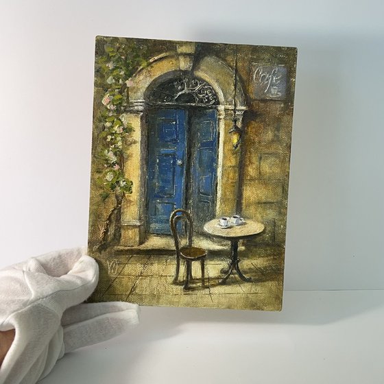 Old Blue Door of a Cozy Café