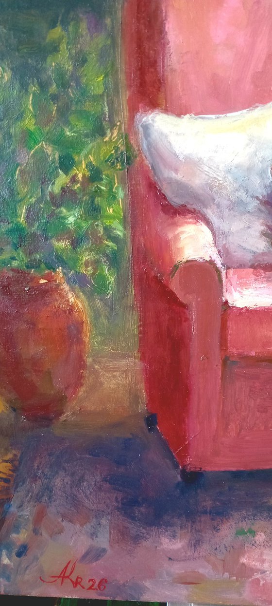 Ginger cat and armchair