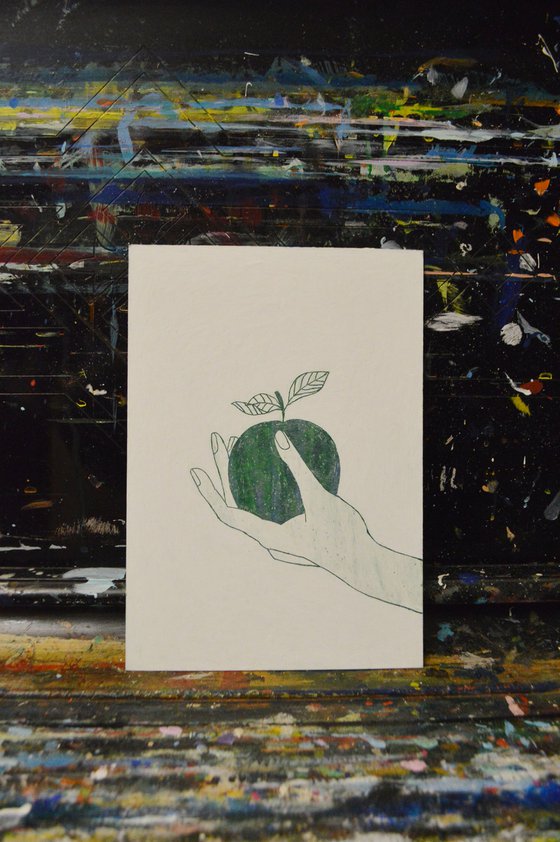 Hand with apple