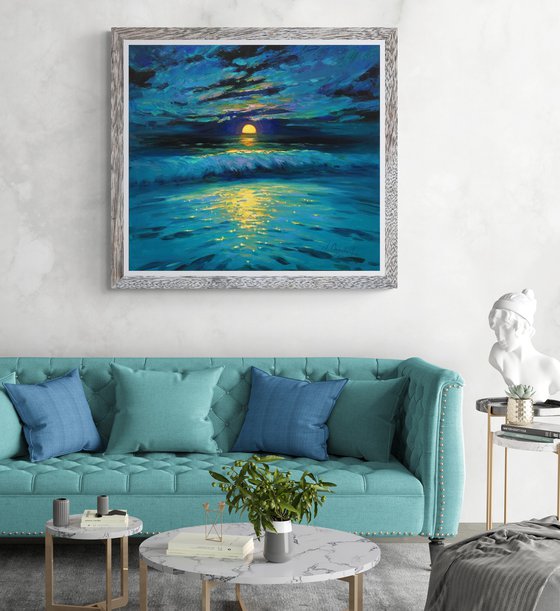 Moonrise in blue over sea