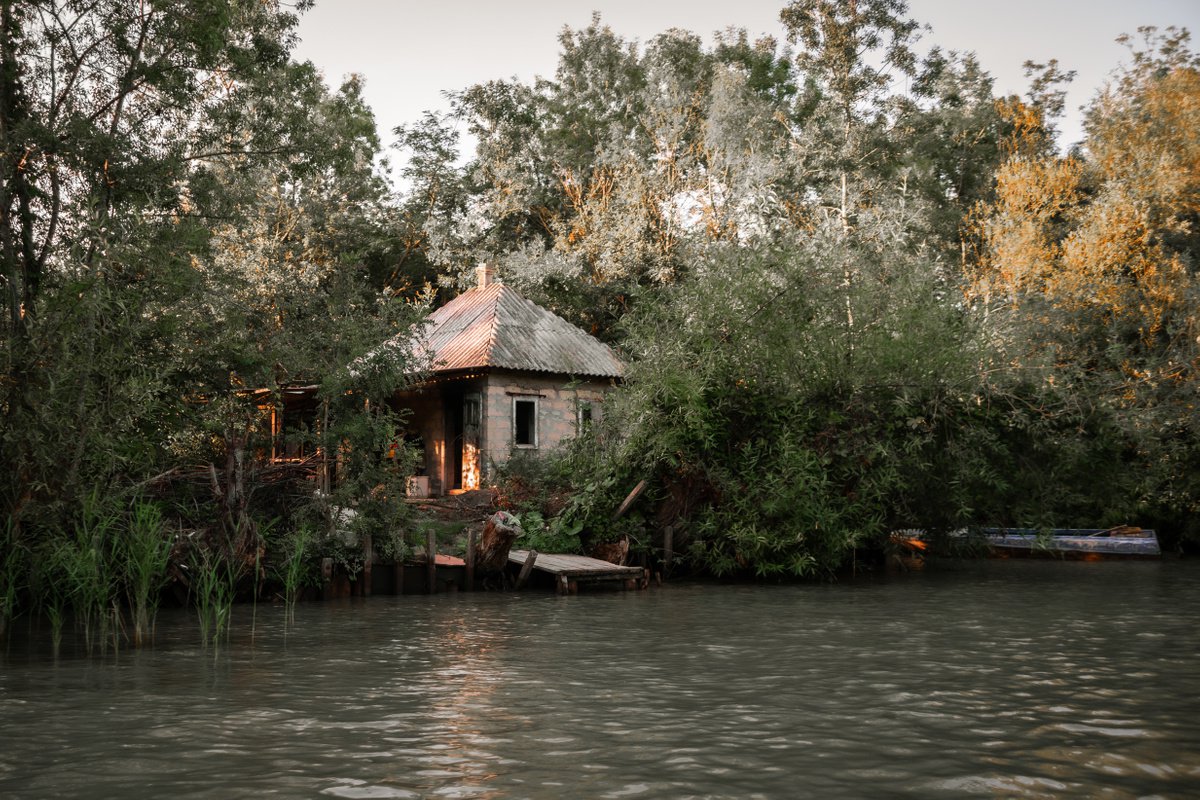 Abandoned house by the river by Vlad Durniev
