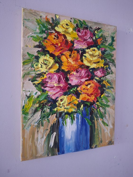 Roses in a blue vase
