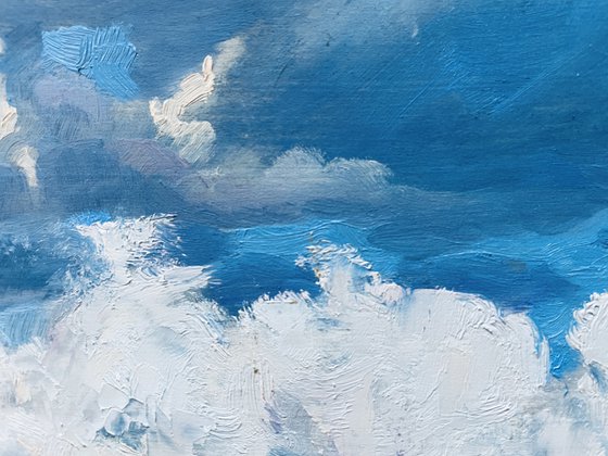 Clouds, boat  and water