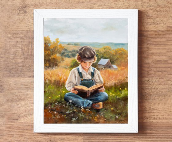 Farmer boy reading a book