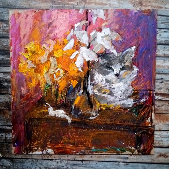 Cat, daffodils, magnolia