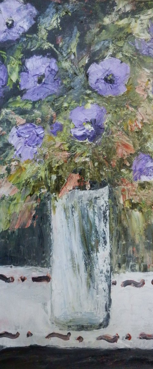 Petunias in a glass vase by Maria Karalyos