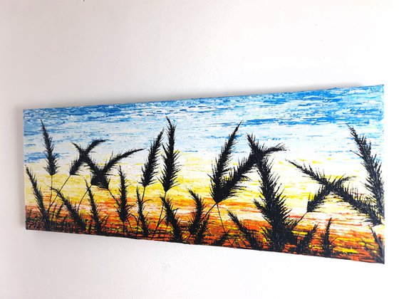 Sunrise In The Grass.