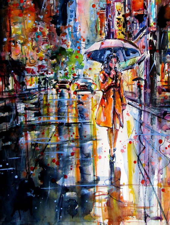 Woman walking in the rain
