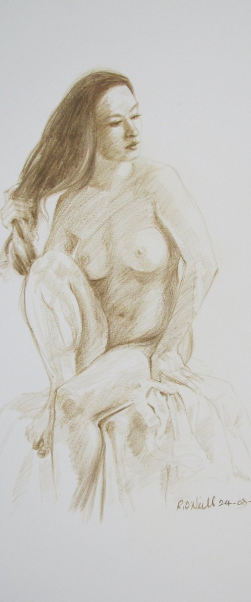 Seated female nude by Rory O’Neill