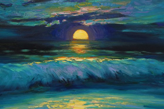 Moonrise in blue over sea