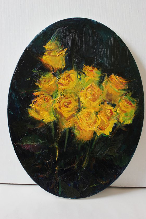 Yellow roses on a green background.